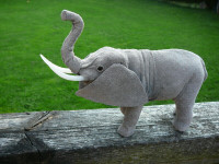 Elephant gifts: doormat, votive holders, Peeper Pal