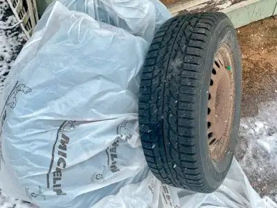 four 235/65/R17 winter tires on rims Bolt pattern: 5 x 114.3 mm Good tread depth: 5/32" should get t...