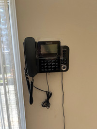 Phone with wall mount and two cordless handsets and chargers 