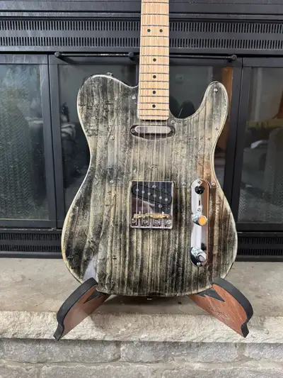 Black Grover Customs T series 002. One of a kind. A beautiful finish. Best way to check it out is @b...
