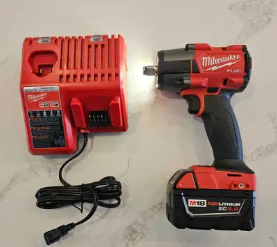 Brand new Milwaukee M18 Fuel 1/2" Mid torque Impact wrench kit, View more
