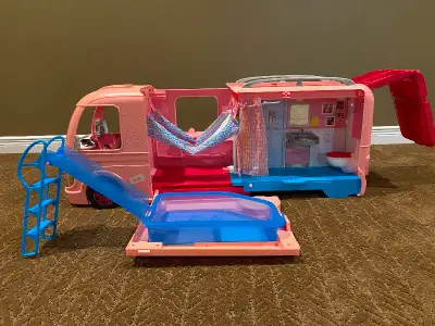 Barbie camper Comes with camping accessories i.e. camp food) (can provide picture)