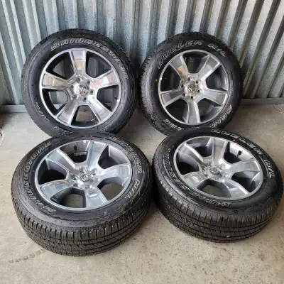 Never left the parking lot. Wheels were removed from truck at dealer when purchased new. Oem Ram 150...