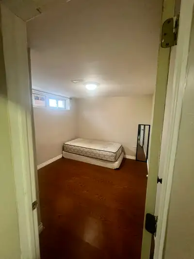 Clean and spacious basement room for rent in a quiet home. Hardwood floors, bright windows, and larg...