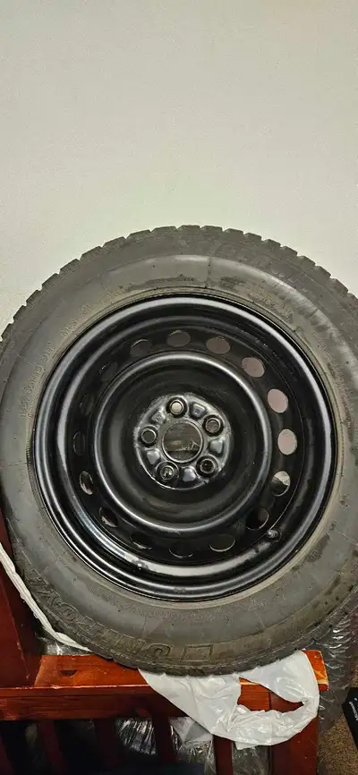 Selling a set of 4 Uniroyal Tiger Paw Ice & Snow all mounted on rims The tires were used on a 2003 T...