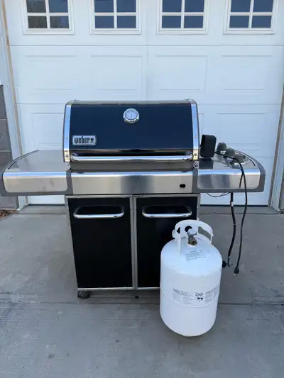 Black Weber Genesis series gas grill., View more