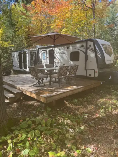 2016-37’ Lacrosse travel trailer with 3 slide outs, as shown. 12’x20’ pressure treated deck with 2x8...