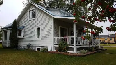 Nicely renovated character home on 4 lots. 1100 square feet on main floor and 600 square feet on upp...