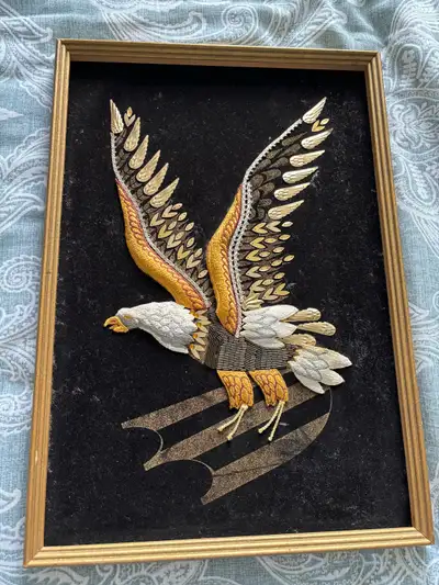 Vintage flying Eagle on black velvet background, 18 1/4” by 12 3/4 wide, all gems and beadwork is in...