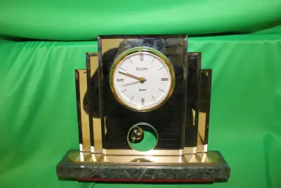 Bulova pendulum battery operated clock, View more