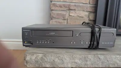 DVD and VHS movies with player, View more