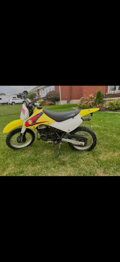 2003 jr 80 bike works good. New sprockets handle grips tires. Blue bike is 2004 crf 50 -1000. And jr...