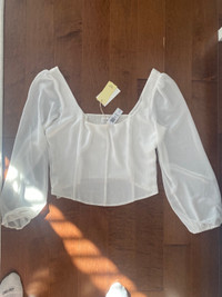 Women aritzia top size XL (model image for reference)