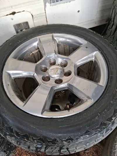 I have a set of 6 bolt Chevy rims and tires the rubber don't have much life left 275/55R20 $350 obo...