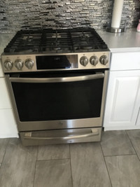 Gas stove top /duel - electric oven