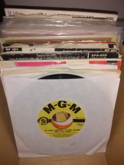 Box of 70 year old, 45's vinyl records., View more