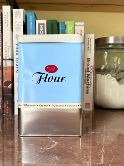 Vintage metal flour tin, View more