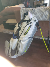 Titalist AP2's Ping golf clubs and nike bag