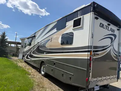 2015 Thor outlaw toy hauler new motor 2023 runs great. Would trade for camper same value.