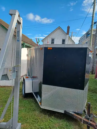 This enclosed tool trailer is a reliable and secure way to transport your tools and equipment, featu...
