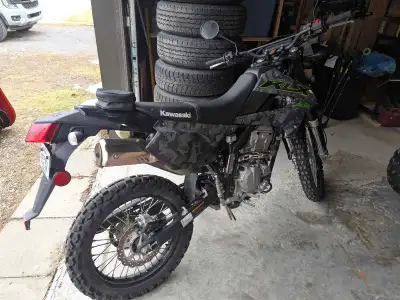 Like nearly new. Only 1300km. Serviced last year. Fully road legal. Will include vehicle hitch bike...