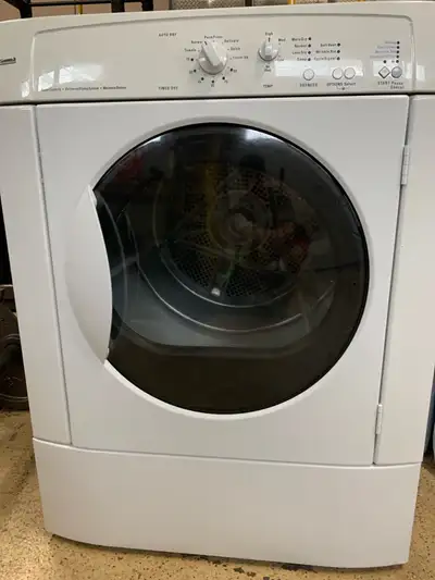 Kenmore clothes dryer. Good working condition - small dent on top.