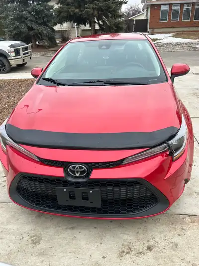 I'm selling a 2021 Toyota Corolla LE with a fuel-efficient engine and smooth automatic transmission,...