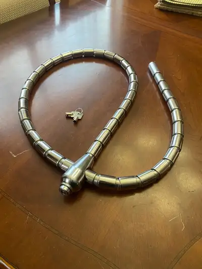Cobra Link motorcycle lock very secure Heavy lock. Rare as they are discontinued but very good lock.