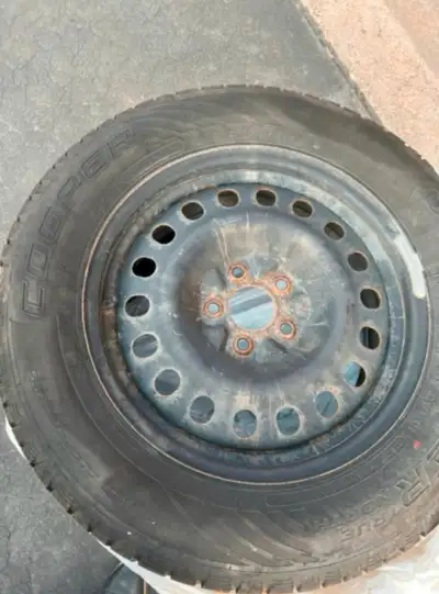 Four Cooper Discover True North Winter Tires on rims, and in excellent condition. 225/65 R17. Manufa...