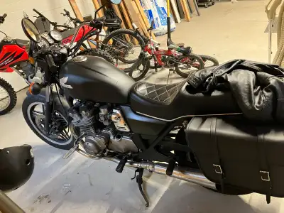 Honda CB 750 C. Matt black on solid chrome. Comes with Hi way pegs, Mac 4 into two exhaust leather b...