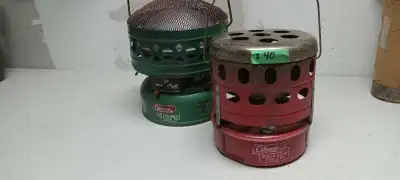 2 very nice Coleman heaters, green and red, located Paris Ont, pick up only