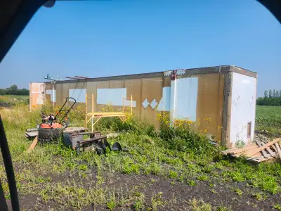 Older 53 foot shipping container. Has a few small holes. Easily fixed. Price is firm at 3000.00 In e...