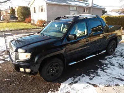 2010 Honda Ridgeline well maintained, no repairs to do, ready to drive, a lot of parts have been cha...