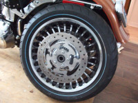 Harley Davidson Motorcycle tire on rim.