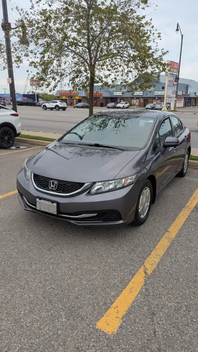 Low km 2014 Honda Civic, single owner, no accident. Car history report available. CVT transmissions,...