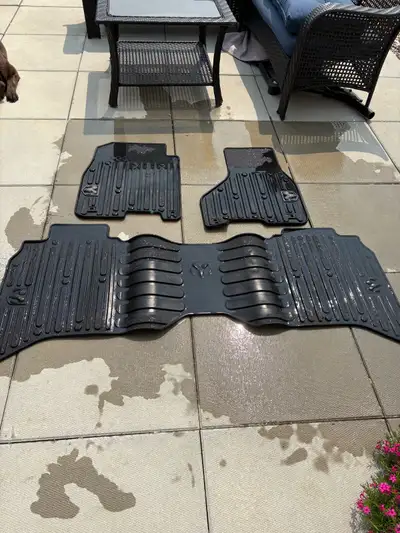 These are a set of genuine Ram 1500 Classic winter floor mats designed to protect your vehicle's int...