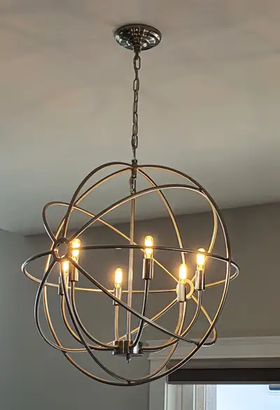 Chandelier type light. 6 LED bulbs. In new home . 2022 Approximate measurements 27” high 14“ chain 2...