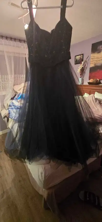 The dress has only been worned for the grad. There is no stain, wrips or anything. If ur looking or...