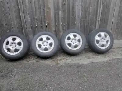 RIMS +TIRES 255 60R17 SET OF FOUR FROM AN SUV ALUMINUM RIMS VALUE ONLY TIRES NO CHARGE LOCATED IN TH...