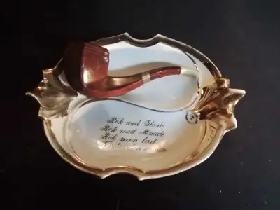 Antique ashtray with a pipe rest, View more