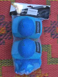 Knee, elbow and wrist pads, new in packaging
