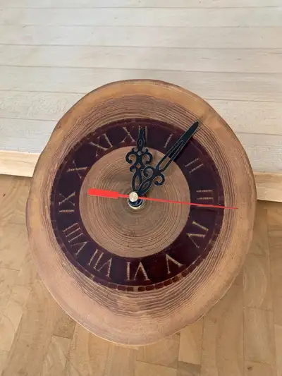 Battery operated clock made of oak slice. Carved with a CNC router and filled with epoxy resin. Can...