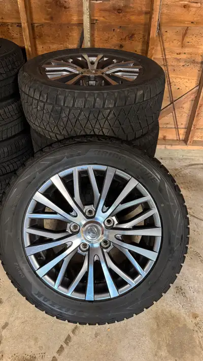 Selling a full set of 4 OEM Lexus LX570 wheels with winter tires. • Wheel Size: 20-inch original Lex...