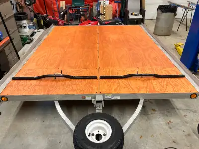 8x10 Triton sled trailer, tilt deck, brand new decking and hardware, spare tire (never used) all lig...