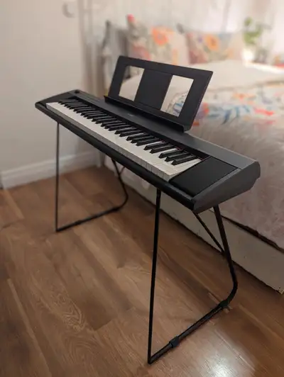 Very gently used Piaggero, complete with stand, original packaging & guide, sheet stand
