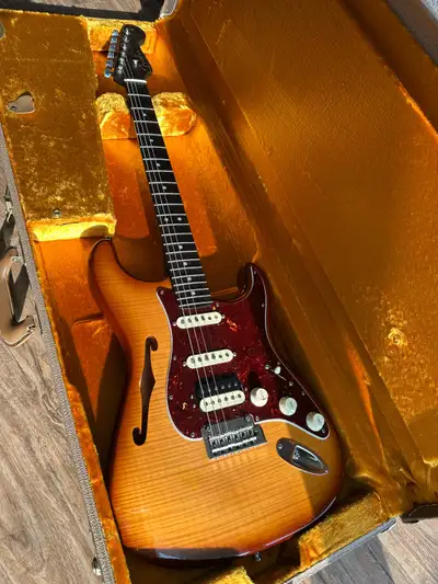 rare find with a one piece dark rosewood neck. Full Set with original case and case candies Replaced...
