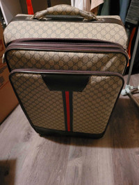 Gucci suitcases