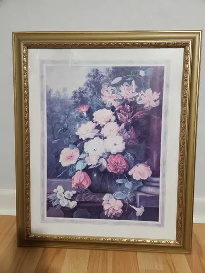 This is a framed Delta Graphics floral print, measuring approximately 19 inches by 23 inches. It's a...