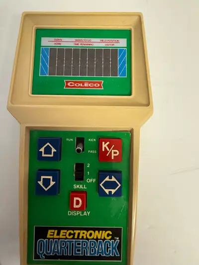 Relive the nostalgia with this vintage Coleco Electronic Quarterback handheld game! This retro gamin...