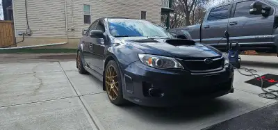 2013 SUBARU IMPREZA WRX ST 114,500 kms Features: ⁃ Engine: 2.5L DOHC turbocharged Subaru BOXER engin...